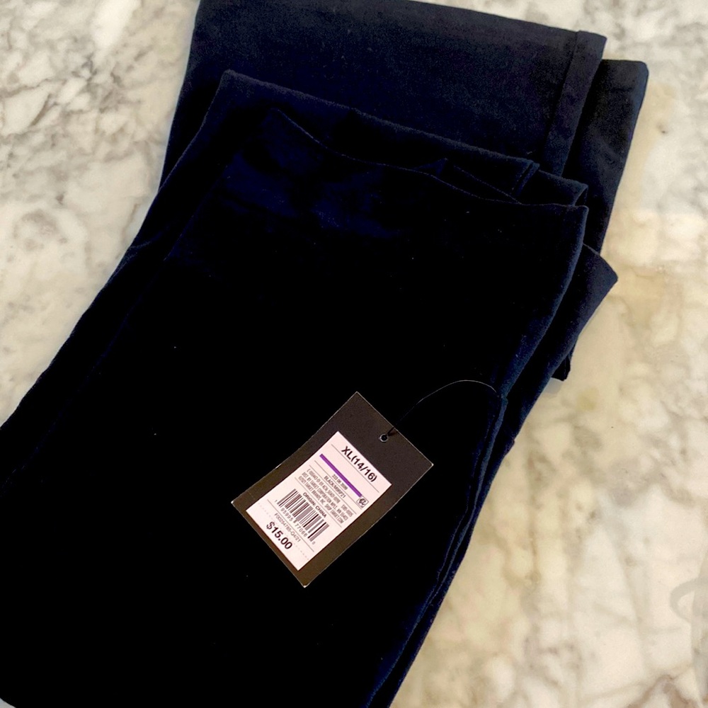 Black stretch bell bottom/ flare pants. From Target Kids Section.